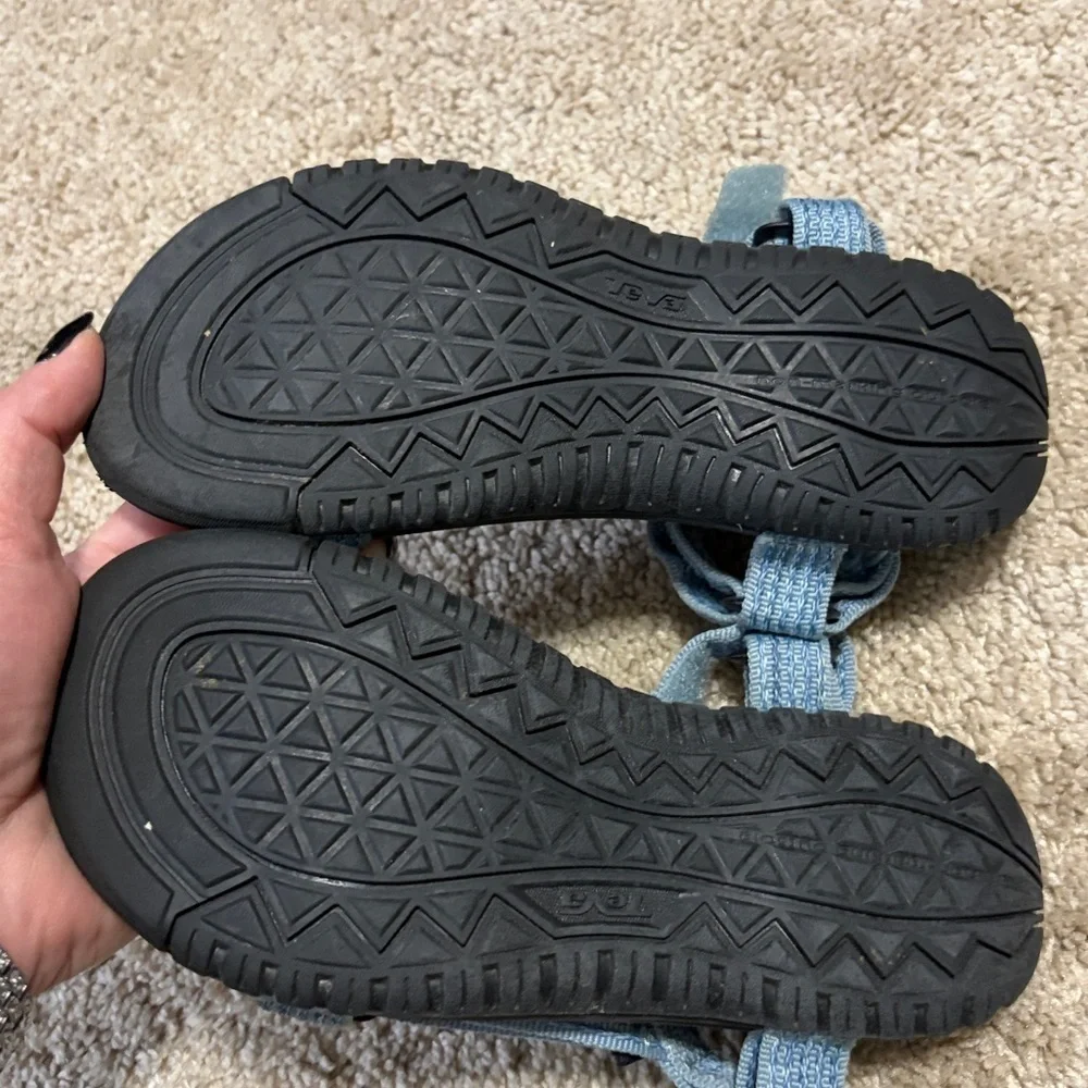 Teva Hurricane XLT2 sandals in a light blue color. Size 2